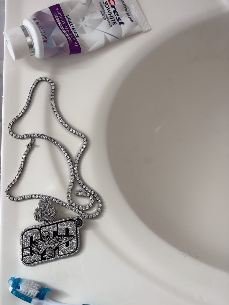 A chain and graphic print caught in the light
